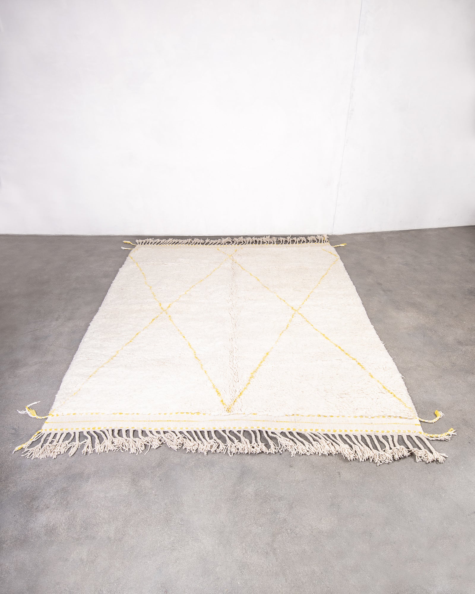 Modern, designer, handcrafted Berber rug from Morocco. Beniourain carpet with beautiful colours and patterns and fluffy wool texture.
